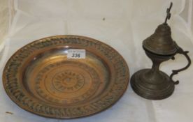 An Armenian brass pix and a 19th Century tinned copper dish with embossed decoration