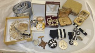 Two boxes of assorted jewellery to include pearls, various brooches including one set with a cameo,