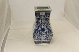 A Chinese blue and white Phoenix and floral decorated vase of square baluster form, bears seal