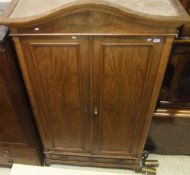 A late 19th Century walnut two door armoire,
