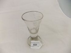 An early 19th Century Norwegian wine glass, the trumpet shaped bowl engraved with two birds facing