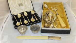 A cased set of six silver teaspoons, a pair of silver salts,