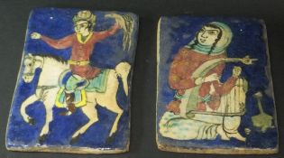 Two Quajar Persian tiles of rectangular form, one depicting a falconer on horseback,