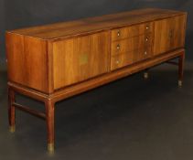 A 1960's rosewood sideboard by Lysberg Hansen & Therp, Kobenhavn, the rectangular top with