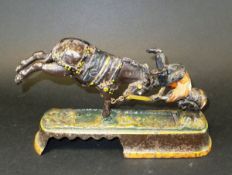 A late 19th Century money box in the form of monkey jockey on horse, marked to base "Always did '