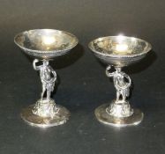 A pair of 19th Century Czechoslovakian silver pedestal sweetmeat dishes with figural stems, 8.