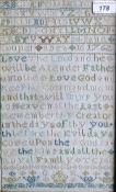 A needlework sampler by Jane Couper, aged 16, dated 1762, featuring the alphabet and a verse from