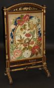 A Victorian mahogany and gilt framed firescreen,