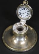 A George V silver capstan inkwell with pocket watch to the rising lid,