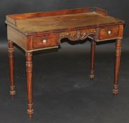 An early Victorian mahogany wash stand, the three quarter galleried top above foliate moulded centre