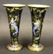 A pair of Wedgwood Fairyland Lustre trumpet vases, designed by Daisy Makeig-Jones "Butterfly Woman",