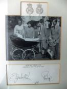 A framed and glazed black and white image of the Royal Family with infant Prince Edward in pram