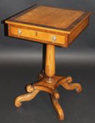 A late Regency oak and rosewood cross banded occasional table with single drawer on a pedestal base