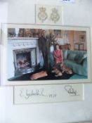 A framed and glazed image of Her Majesty The Queen and Prince Philip in Drawing Room with three