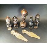 Three West African wooden figures comprising a devil style figure,