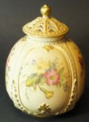 A Royal Worcester blushware floral decorated pot-pourris vase and cover (inner grille missing),