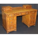 A late Victorian aesthetic oak dressing table with superstructure (missing), two drawers over a