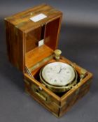 An early 20th Century brass cased ship's chronometer by Dent of London, No'd.