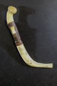 A 19th Century Japanese Meiji period carved antler and bone leather mounted knife,