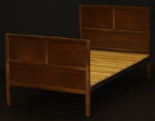 A circa 1950 walnut bedstead by Fred Gardiner (Provenance: Believed by the family to have been made