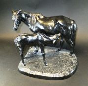 A 20th Century Russian painted cast iron figure group of mare and foal, date 1968,