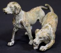 A cold-painted bronze figure of two hounds, 10 cm long CONDITION REPORTS Overall quite heavily