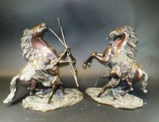 AFTER COUSTEAU "The Marley Horses", a pair of patinated bronzes,