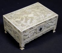 A 19th Century Chinese carved ivory rectangular box or cricket cage with all over air dragon