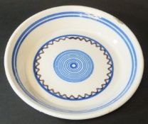 A circa 1800 Delft white ground plate with blue ring and wavy line decoration, 20 cm diameter