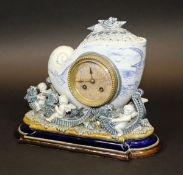 A fine and rare Doulton glazed pottery cased clock, modelled by George Tinworth and decorated by