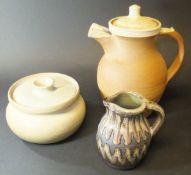 A Simon Eeles Shepherds Well Pottery glazed stoneware cream jug, 10.