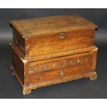 A 19th Century Welsh oak and pine coffer bach with rising lid over two short and one long drawer