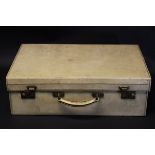 A velum covered suitcase marked "MER", stamped "Finnigan's Makers Bond St London", 50.5 x 16.