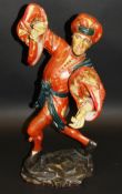 A circa 1924 German painted plaster figure of a Morris Dancer after the original by Erasmus Grasser