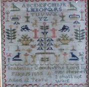 A Victorian tapestry sampler by Isabella Gooch, aged 12 years, dated May 15 1855,