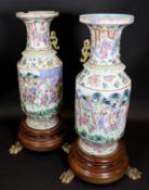 A pair of 19th Century Chinese Canton famille rose vases, the rims with Greek key style decoration