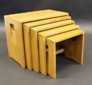 A nest of five Ercol light elm "Windsor" rectangular occasional tables, 51 cm wide x 39.5 cm