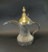 A Turkish brass coffee pot, 42.