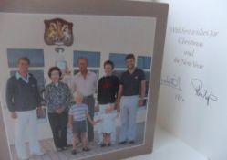 A Christmas card from Her Majesty The Queen and Prince Philip depicting The Queen and Prince Philip