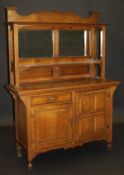 An oak Arts & Crafts mirror back sideboard,