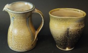 A Toff Milway pale brown mottled and blue glazed jug, 15.