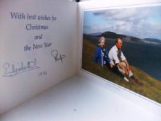 A Christmas card from Her Majesty The Queen and Prince Philip depicting The Queen and Prince Philip