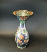 A Chinese cloisonné vase with ovoid body decorated with flowers and trumpet shaped neck, 37.5 cm