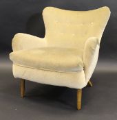 An Ernest Race (1913-1964) DA2 low button back chair in pale gold upholstery, on beech legs