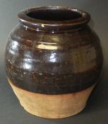 A Buckley Pottery semi-glazed terracotta jar, 19.5 cm high CONDITION REPORTS Overall with wear and