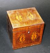 A Regency mahogany and inlaid single section tea caddy with shell marquetry inlaid medallion