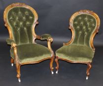 A pair of Victorian carved walnut framed buttoned spoon back ladies and gentleman's salon chairs