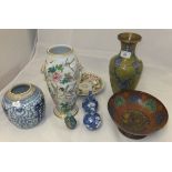 A collection of Oriental items to include a blue and white ginger jar, a porcelain vase,