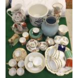 A collection of china wares to include a set of six Royal Crown Derby coffee cans and saucers