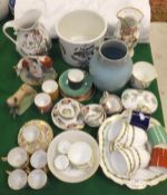 A collection of china wares to include a set of six Royal Crown Derby coffee cans and saucers